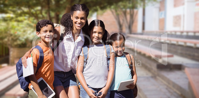 Composite image of portrait of teacher with students