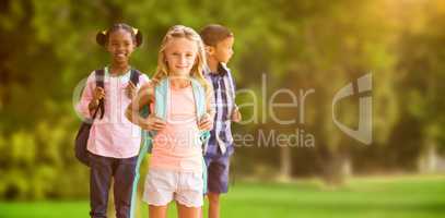 Composite image of portrait of girl standing with friends