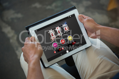 Composite image of graphic image of slot machine on mobile display