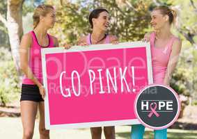 Go Pink and pink breast cancer awareness women holding card