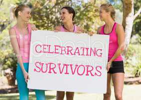 Celebrating survivors text and pink breast cancer awareness women holding card