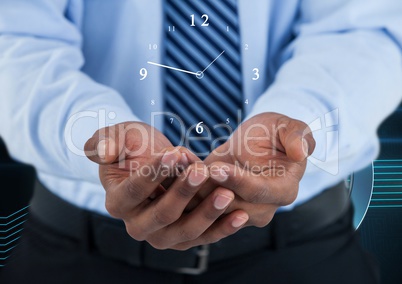 Business man holding a clock against background with clock