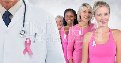 Breast cancer doctor and women with pink awareness ribbon