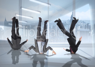 3 businessmen upside down stuck with transition background