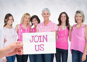 Join Us Text and Hand holding card with pink breast cancer awareness women