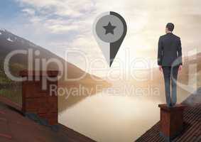 Marker location pointer and Businessman standing on Roofs with chimney and lake mountain landscape