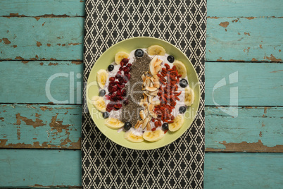Fruit cereal in plate on a napkin cloth