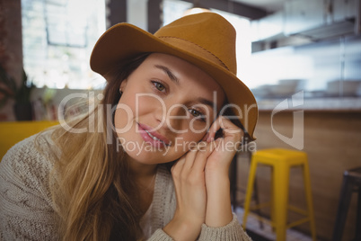 Portrait of woman relaxing in cafe