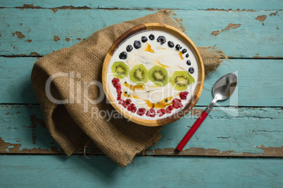 Yogurt and fruits in bowl