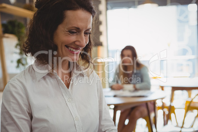 Happy woman in cafe