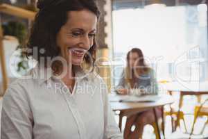 Happy woman in cafe
