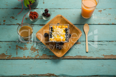 Breakfast tray with glass of juice and tea