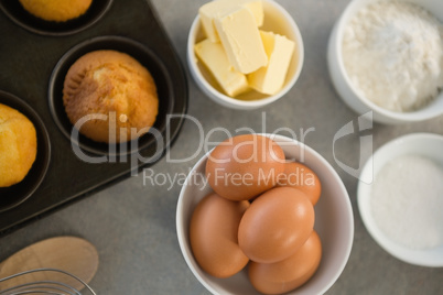 Directly above shot of ingredients by muffin tin