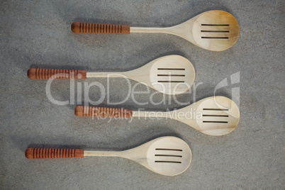 Overhead view of spatulas arranged side by side