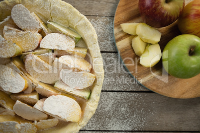 Overhead view of apple pie preparation