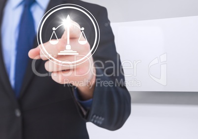 businessman pointing at justice icon