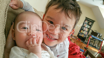 Adorable Chinese and Caucasian Baby Boy and Brother
