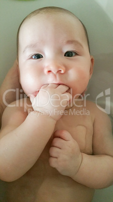 Adorable Chinese and Caucasian Baby Boy Playing Getting A Bath
