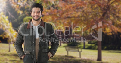 Man in Autumn with coat in forest