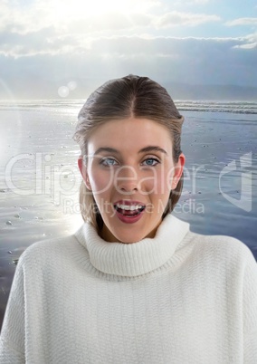 Woman in warm jumper surprised on beach landscape