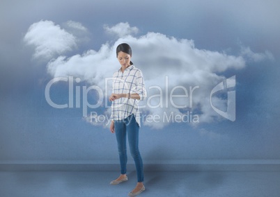 Businesswoman checking the time on watch with clouds