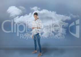 Businesswoman checking the time on watch with clouds