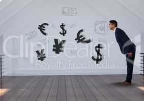 businessman bending  in front of money on wall