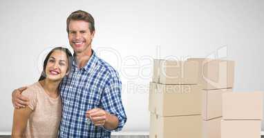 people moving boxes into new home