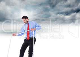 Businessman pulling rope in sky