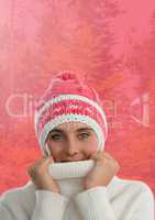 Woman in Autumn with hat and jumper in pink forest