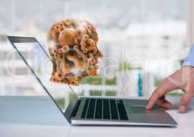 3d head made of cogs poping out  of laptop screen