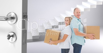 people moving boxes into new home