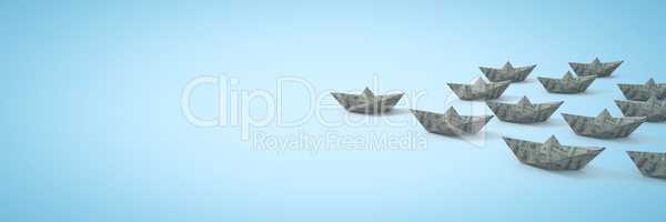 Group of dollar money Paper boats on blue background