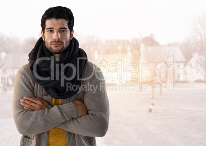 Man in Autumn with  with scarf and folded arms in housing estate
