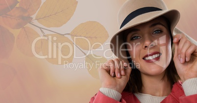 Woman in Autumn with hat with leaves