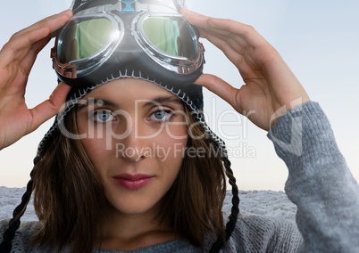 Woman with ski glasses in snow landscape
