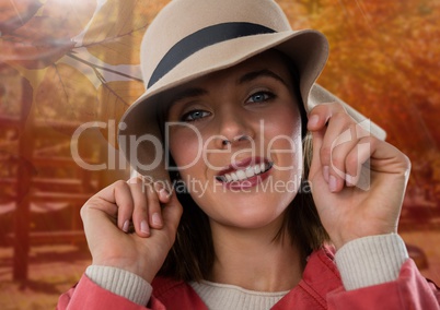 Woman in Autumn with hat in forest park