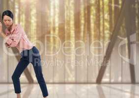 Woman leaning by forest windows