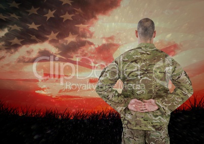 veterans day soldier in front of flag