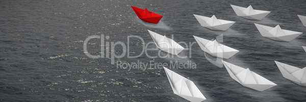 Composite image of digital image of paper boats
