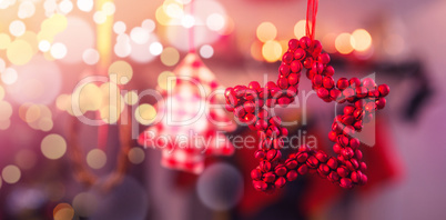 Christmas ornaments hanging on ribbon