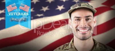 Composite image of close up of smiling soldier