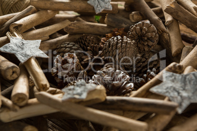 Artificial nest with decoration and thread spools