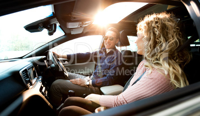 Couple talking while sitting in car