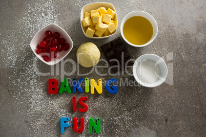 Various baking ingredients and alphabet forming baking is fun