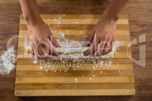 Woman preparing a dough