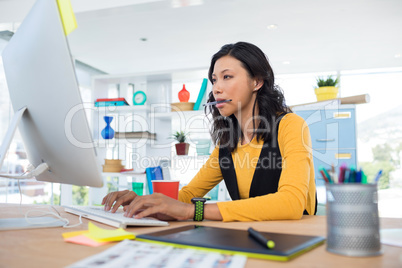 Female executive working on computer Female executive working on computer