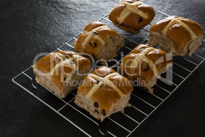 Hot cross bun on baking tray