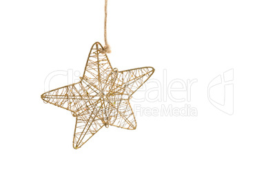 Handmade star hanging against white background