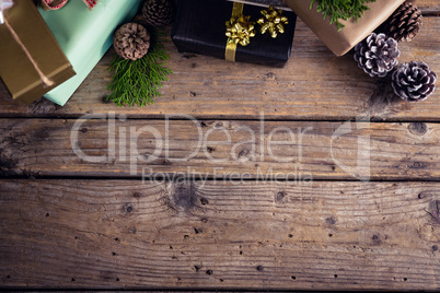 Gift boxes on wooden plank